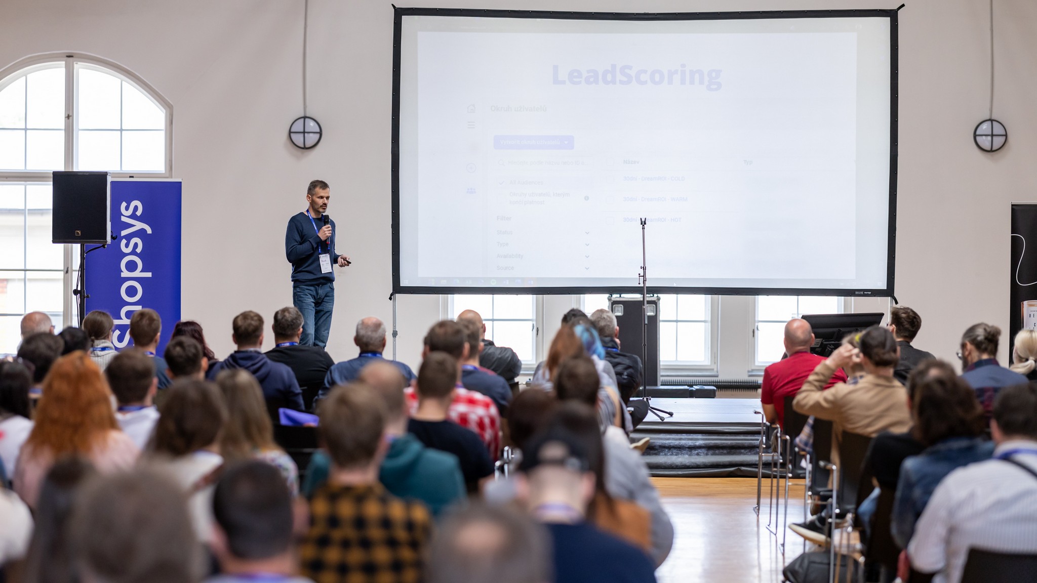 Daniel Nytra speaking to an audience about lead scoring